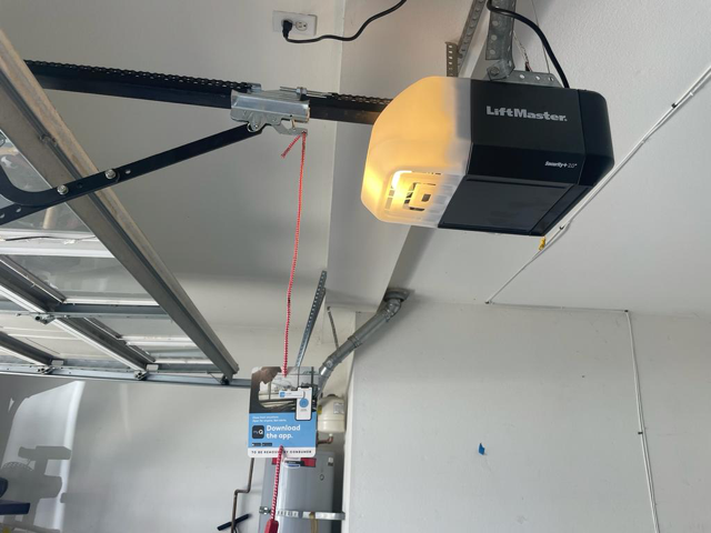 Speedy garage door installation services for a new LiftMaster motor with battery backup and Wi-Fi connection