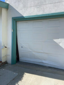 Damage one piece Garage Door Before new garage door installation